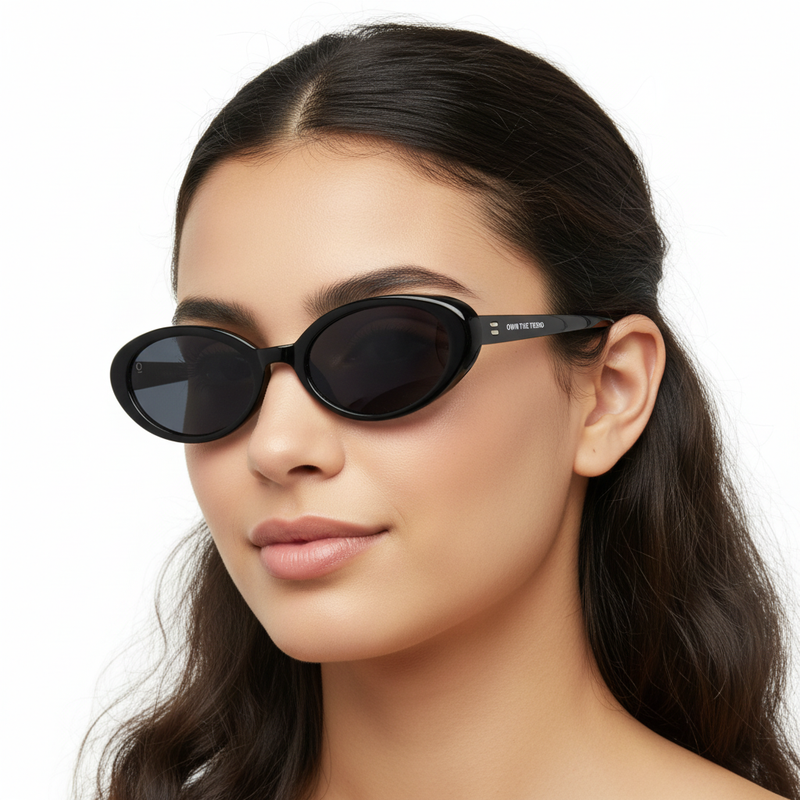 Female model with LUCA BLACK sunglasses - studio white background